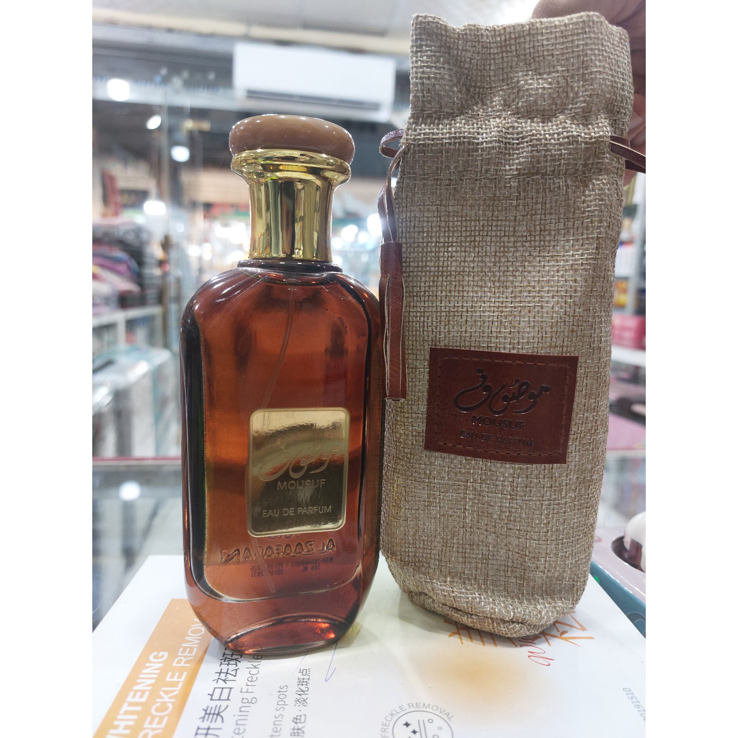 عطر ادکلن موصوف قهوه ای ارض الزعفران MOUSUF